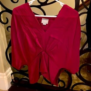100% silk top size 4 with zipper on the left hip to enclose